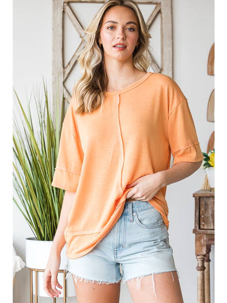 Tangerine short sleeve top with outside stitching detail